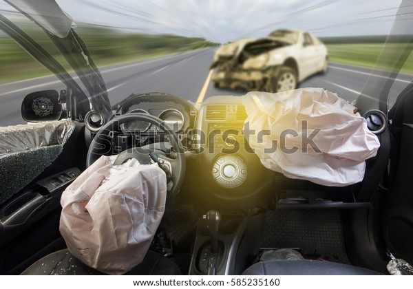 Car of accident make airbag explosion\
damaged at claim the insurance company. Double exposure car\
accident and road on cityscape.  Image blur focus \
style.