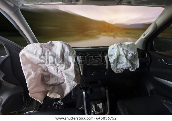 Car of accident make airbags explosion damaged at\
claim the insurance company. Double exposure car accident and road\
with mountains. Image adjustment beautiful color  and blur focus\
style.