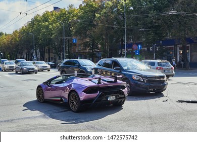 Car Accident On A City Road On 25th Of June 2019,  Luxury Sports Car After Collision With A Crossover, In Riga Latvia