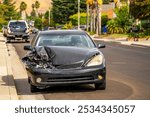 Car accident on the road. Smashed front of passenger car.