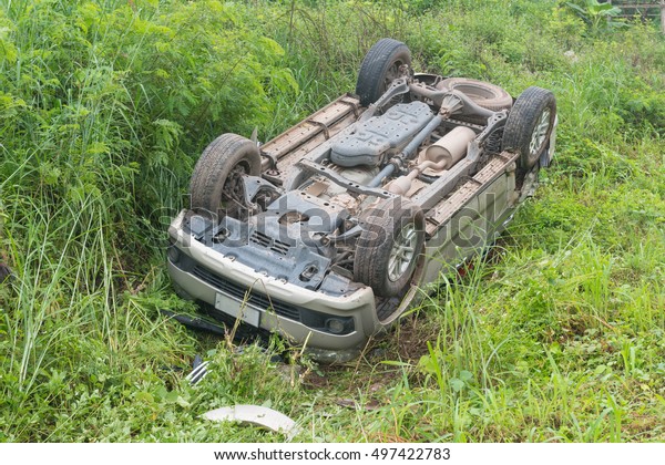 Car\
accident on road.car turned upside-down after\
road.