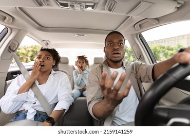 Car Accident. Shocked African American Family Driving Automobile Having Problem And Risk Of Auto Crash Riding In City. Transportation And Traffic Issues Concept. Selective Focus