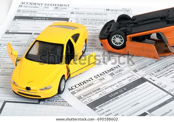 Car\
accident statement. Toy cars. Accident\
concept.