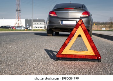 Car accident triangle. Auto vehicle broken down on road. Motor car problem concept - Powered by Shutterstock