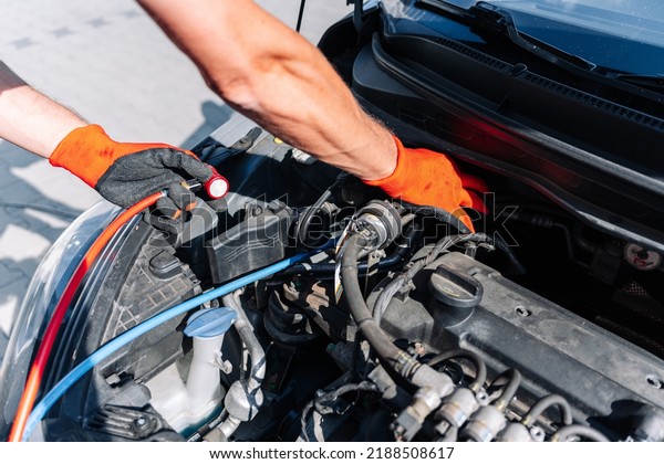 Car air conditioner ac repair service. Refill\
automobile ac compressor and checking auto conditioning system.\
Mechanic engine auto car\
service