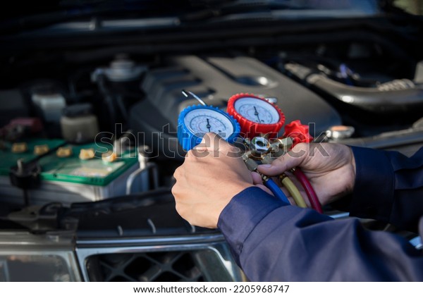 Car air conditioner check service leak test\
and fill refrigerant.