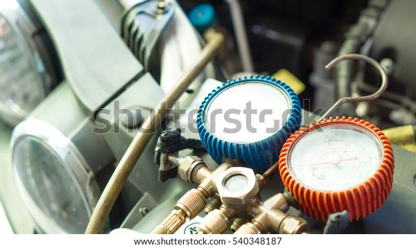 Car and air conditioner service\
concept - Car air conditioner check service and copy\
space