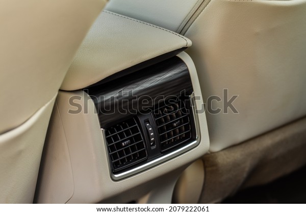 Car air
conditioning close up view. The air conditioner flow inside the
car. Detail interior of car. Air
ducts.