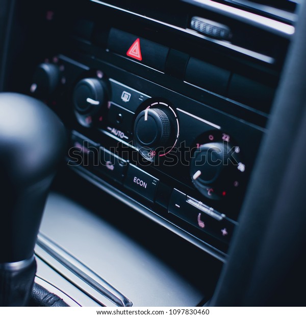 Car air conditioning control panel inside a car.
Car interior