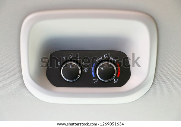 car air\
conditioning and fan control\
buttons