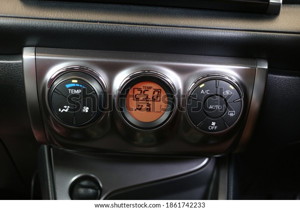 Car air conditioning system, The air conditioning\
button inside a car.