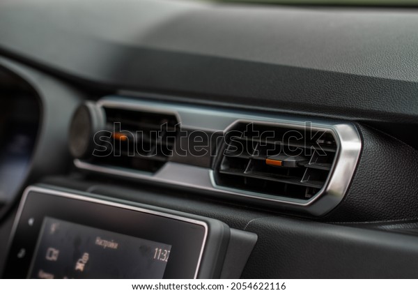 Car air conditioning system. Car air condition.\
Modern car interior detail.