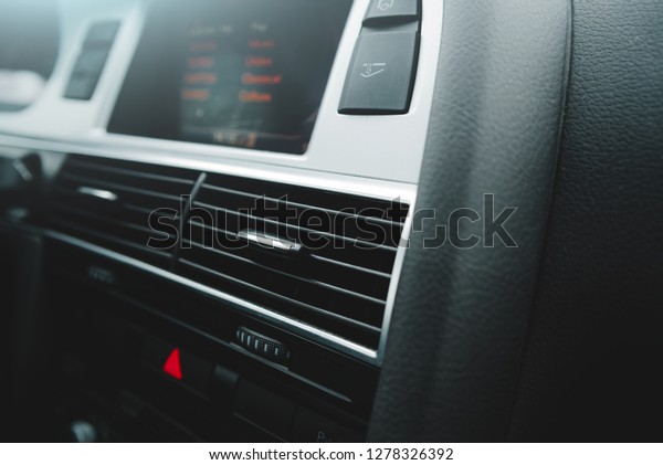 Car air conditioning system and the air\
flow inside the car. Detail interior of\
car