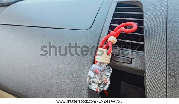 Car air freshener\
attached to the air duct