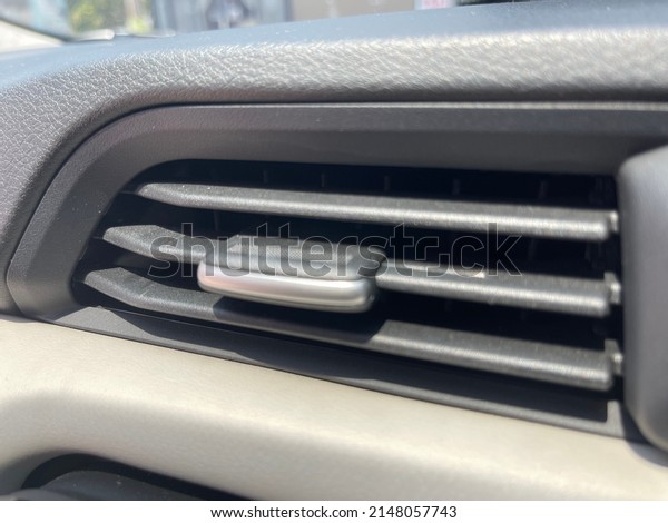 Car air vents can be adjusted to divert air inside\
the car