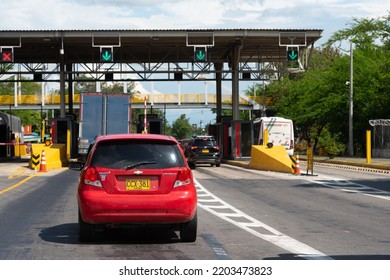 Car Arriving At A Rural Highway Toll Booth. Tolima. Colombia. March 4, 2022