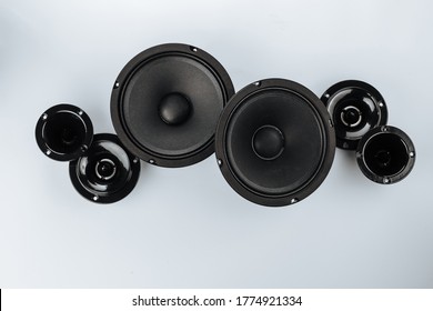Car audio, car speakers, black subwoofer on a white background. Copy space