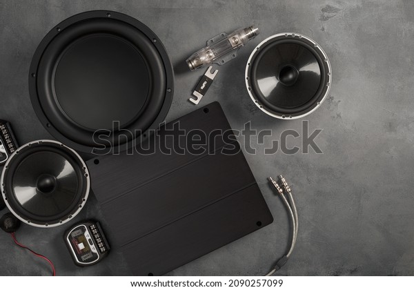 car audio, car speakers, subwoofer
and accessories for tuning. Dark background. Top
view.