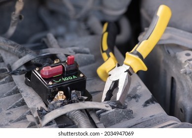 Car Audio System Circuit Breaker And Work Tools Close Up Background.