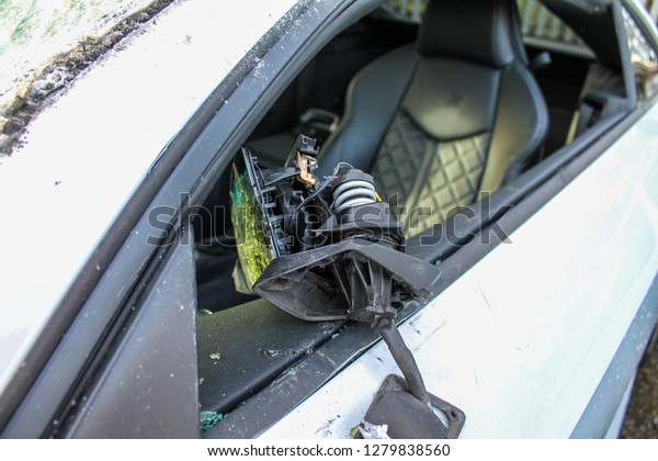 Car / Auto crash;\
Broken wing mirror.