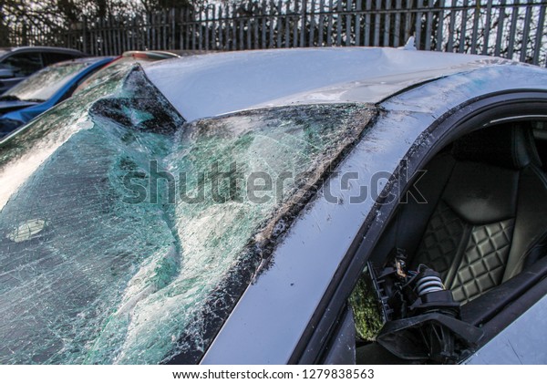 Car / Auto crash;
Smashed windscreen.