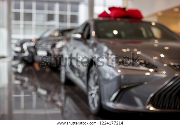 Car auto dealership. New cars at dealer\
showroom. Prestigious\
vehicles.