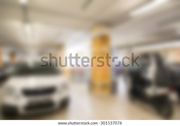 Car auto dealership themed blur background with\
bokeh effect
