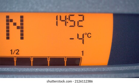 Car Automobile Dashboard LED Orange Display. High Vehicle Mileage, N Neutral Shift Gear, Full Tank Of Gasoline, Cold Icy Road In Winter Warning.