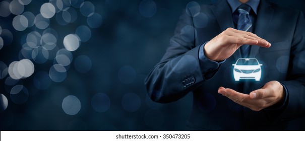 Car (automobile) insurance and collision damage waiver concepts. Businessman with protective gesture and icon of car. Wide banner composition and bokeh in background.