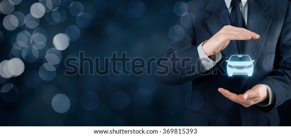 Car (automobile)\
insurance and collision damage waiver concepts. Businessman with\
protective gesture and icon of car. Wide banner composition with\
bokeh in background.\
