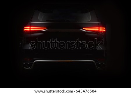 Car back lights shining in the dark