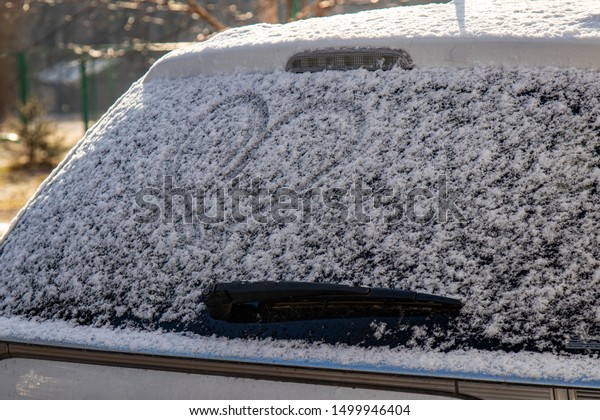 car back
window covered with snow.After
snowfall