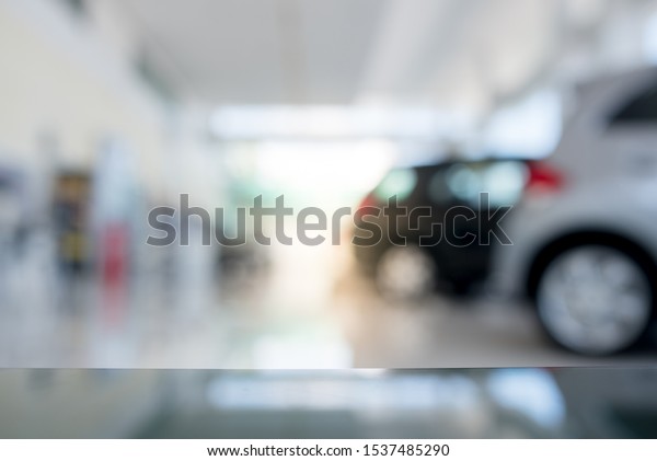 Car\
background blur, new cars at the car showrooms, blur at work or\
abstract backgrounds of depth of field at the\
office.