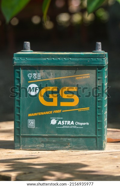 Car battery with\
famous manufacturer\'s label on the table. Tegal, Central Java,\
Indonesia 17 May 2022.
