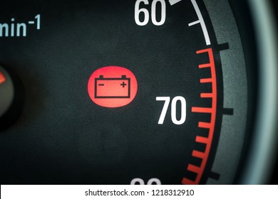 Car Battery Light In Dashboard Warning About Problems. Vehicle Panel With Red Indicator Electricity Icon And Symbol. Service Or Maintenance Needed.