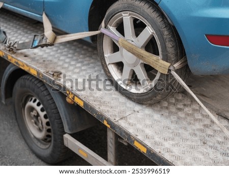 A Car Being Towed After A Parking Violation Or Breakdown