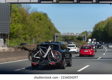 Car With A Bike Rack Rides On Germany Autobahn