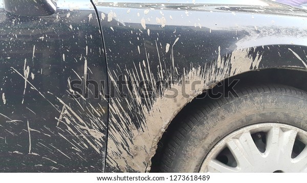 car body with mud\
marks