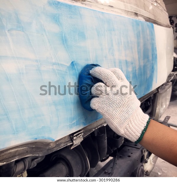 Car body
work auto repair paint after the
accident.