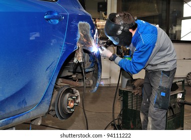 Car body worker. - Powered by Shutterstock