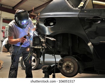 Car Body Worker Welding Car Body.