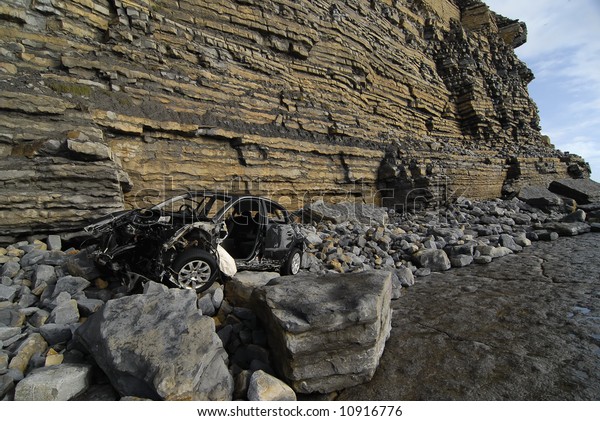 Car at bottom of\
cliff