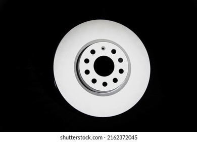 Car brake discs on a black background, isolate. Disc brake system, effective braking - Shutterstock ID 2162372045