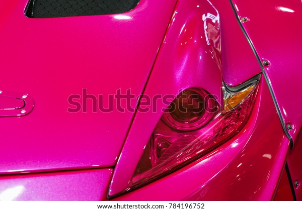 Car brake light\
pink.