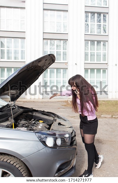 the car\
breakdown, girl on the road,\
stress