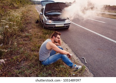 The car broke down, smokes from under the hood, the driver
shocked