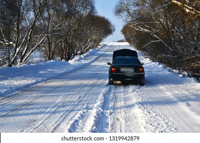 The Car Broke Down In The Winter On The Road