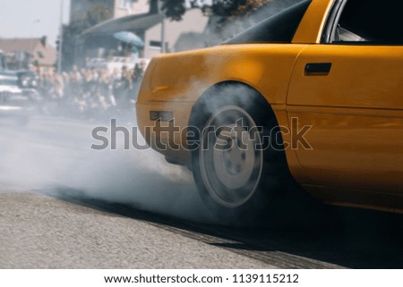 Car burn out and drift at the city street