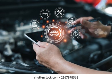 Car business concept and technology on virtual screen, Serviceman working onsite use tablet check service cycle for maintenance of car with the engine room in the background, Smart work of car service - Powered by Shutterstock