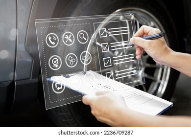 Car business and Insurance concept on a virtual screen, A man checklist for damage point car service warranty accident record the details in the claim document so that customers are satisfied 